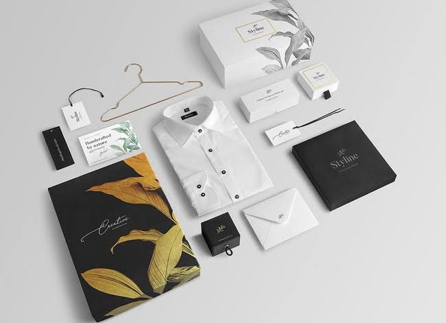 Folded clothing wrapped in branded packaging