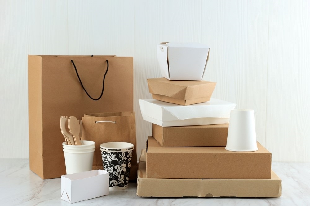 Ribbon-tied gift bag with brand tag